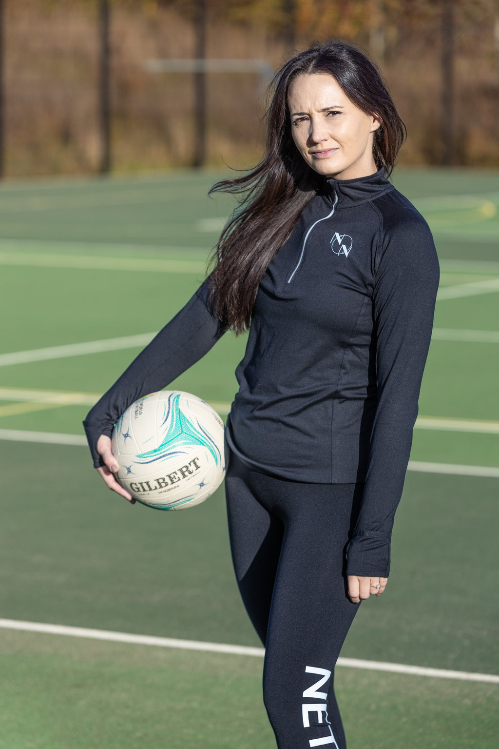 Ladies Black Long Sleeve Zip Neck Performance Top