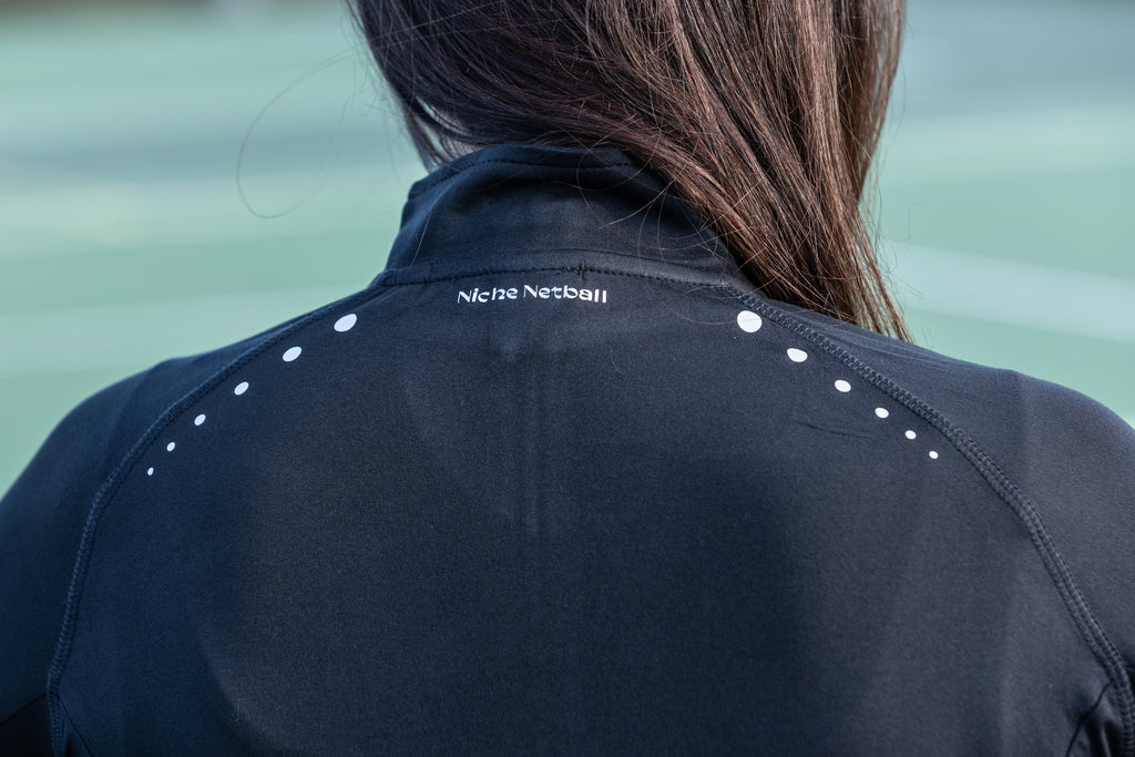 Ladies Black Long Sleeve Zip Neck Performance Top